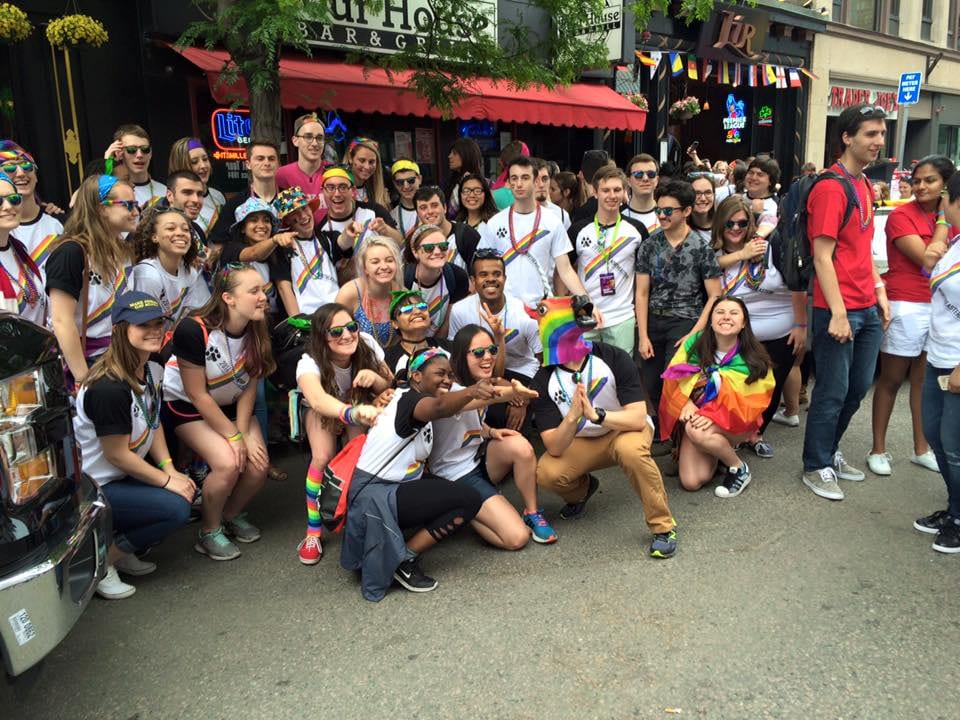 A large group of Northeastern students at a PRIDE parade